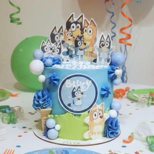 Bluey Themed Birthday Cake featuring favourite characters, fun and colourful, handmade and customisable, perfect for kids’ birthday parties, available for delivery in Basildon and Essex.