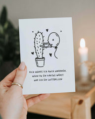 Postkarte mit Spruch und motiv Kaktus und Luftballon in schwarz weiss