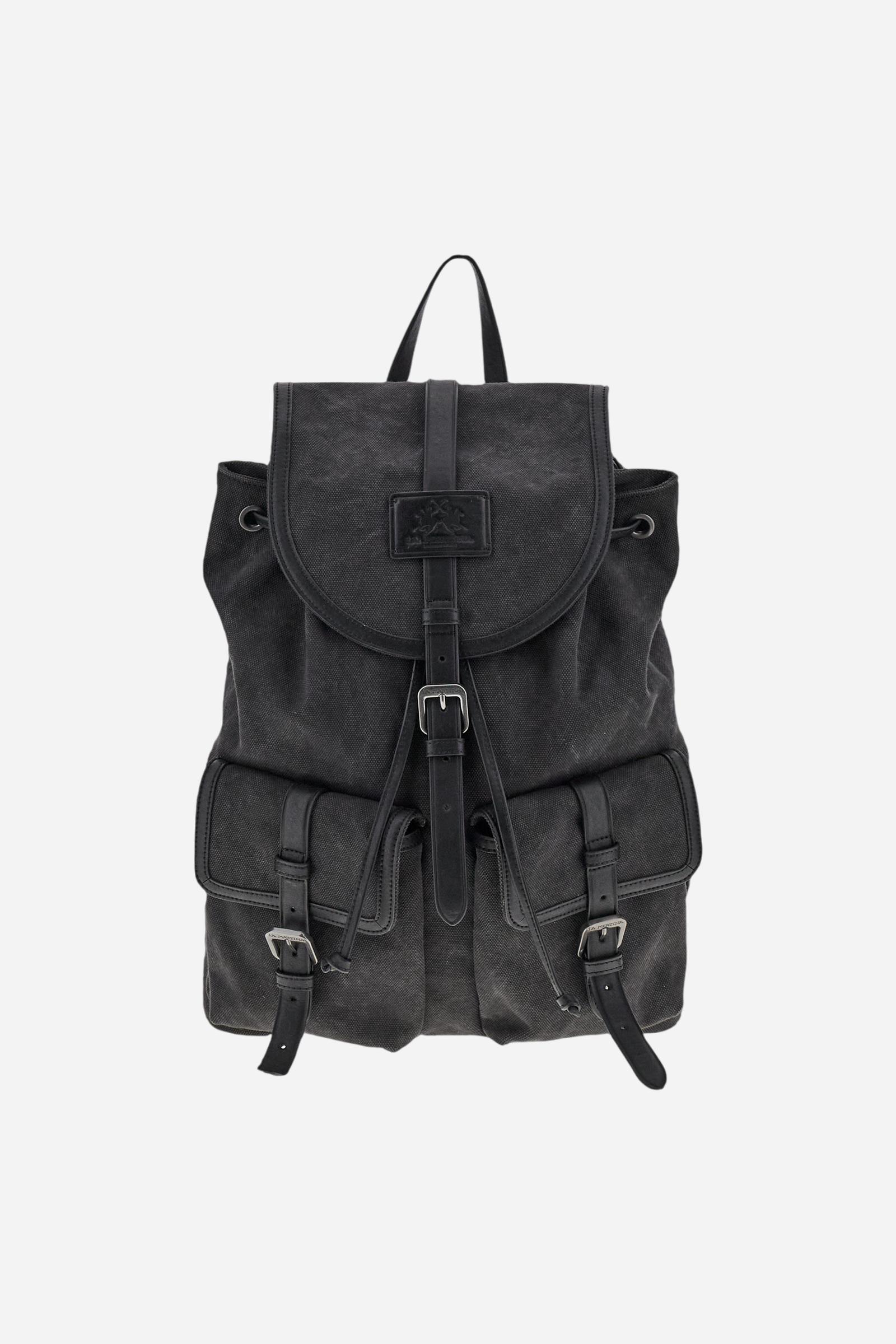 Backpack in washed canvas and leather. Versatile and roomy, with double closure, large front pockets and embossed leather tag. - Black